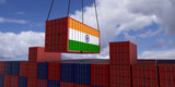 Fototapeta Dmuchawce - A freight container with the indian flag hangs in front of many blue and red stacked freight containers - concept trade - import and export - 3d illustration