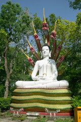 Wall Mural - Stucco art Buddha image in a Thai temple