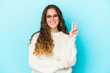 Young caucasian curly hair woman isolated showing number two with fingers.