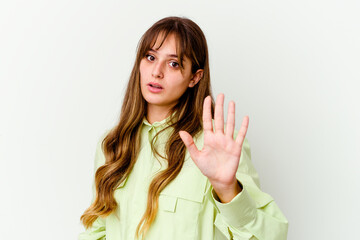 Wall Mural - Young caucasian cute woman isolated on white background being shocked due to an imminent danger