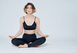 © SHOTPRIME STUDIO - woman go in for sports on a light background yoga meditation asana