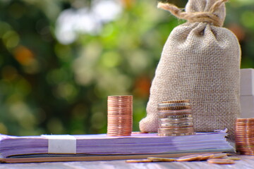 Poster - Stack of coin on table background and business or finance saving money