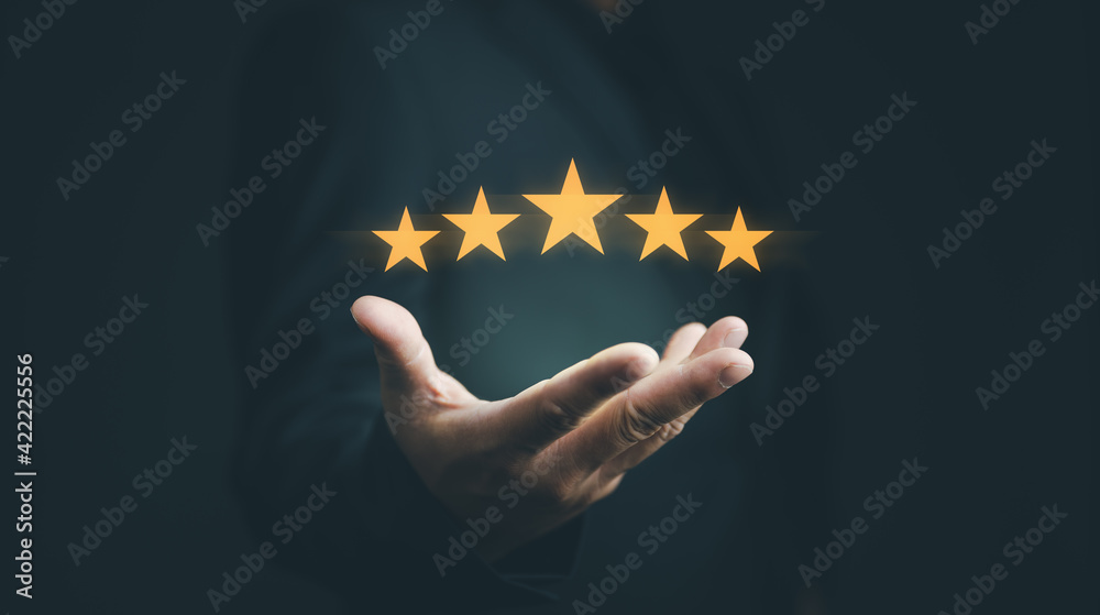 Customer evaluation feedback.men in suit Giving Positive Review for Client's Satisfaction Surveys.giving a five star rating. Service rating, satisfaction concept - obrazy, fototapety, plakaty 