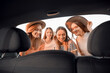 © Pixel-Shot - Happy young women near modern car