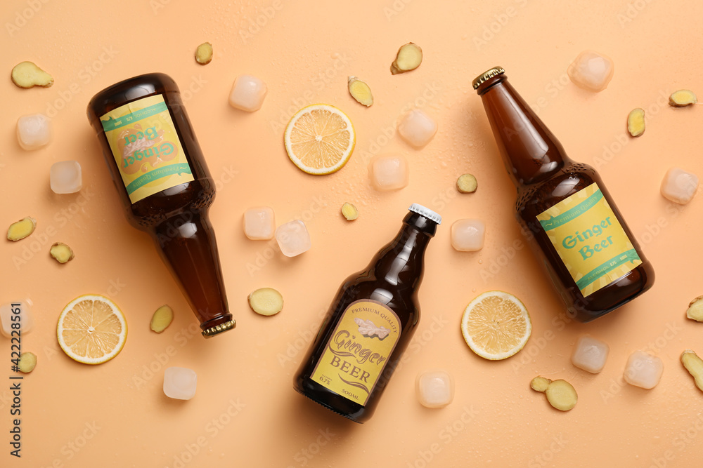 Bottles of fresh ginger beer on color background