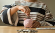 © Orathai - Woman's hand. putting coins in the piggy bank with coins, saving money with coins, stepping into a successful growing business, and saving for thought in retirement. Retirement savings concept