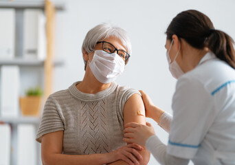 Wall Mural - Senior woman after vaccination.