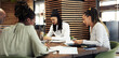 © Flamingo Images - Young businesspeople working together