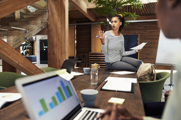 Wall Mural - Young businesswoman meeting with office colleagues