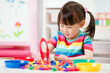 © M-image - young girl play math and color sorting fine motor skill game for  homeschooling