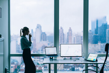 Focused businesswoman drinking hot coffee