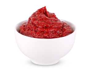 White bowl of tomato sauce or ketchup isolated on a white background