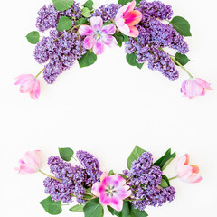  Frame of lilac and tulips flowers on white. Flat lay