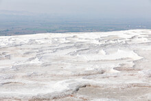 Left Dry, Waterless Edge Of White Travertine Calcium Mountain Pamukkale In Turkey.