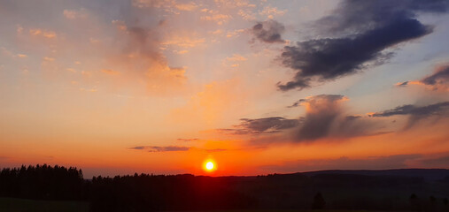 Wall Mural - Colorful sunset with beautiful natural abstract clouds