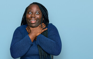 Poster - Young black woman with braids wearing casual clothes shouting and suffocate because painful strangle. health problem. asphyxiate and suicide concept.