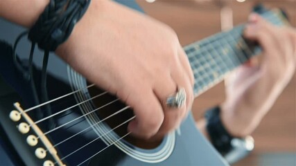 Wall Mural - Artist Man Playing On Acoustic Guitar. Art And Music Concept. Close up