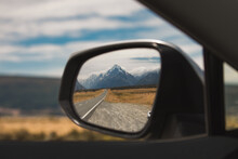 View Of Mount Cook New Zealand In The Rear View Mirror. End Of Journey. Traveling Is Over