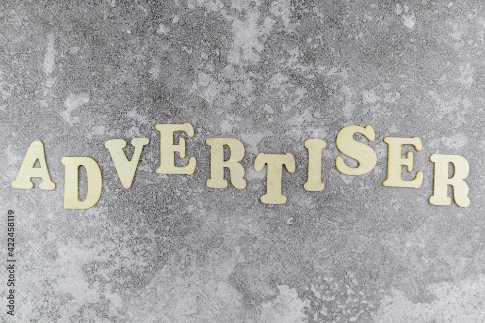 Physical Advertiser Lettering Advertiser concept with decorative alphabet letters in an undulating ...