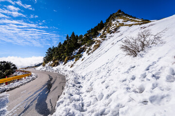 snow and ice covered on asphalt road in Hehuan Mountain of Taiwan, Asia. Taroko National Park is one of Taiwan's most popular tourist attractions.