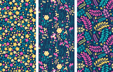 Set of vector floral seamless patterns. Blooming midsummer meadow. Bright colorful pink and yellow flowers, leaves and stems on a dark background. Different flowers on the field. Scandinavian style.