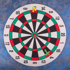 Business and success concept. Hitting in the target. Dartboard and arrow.
