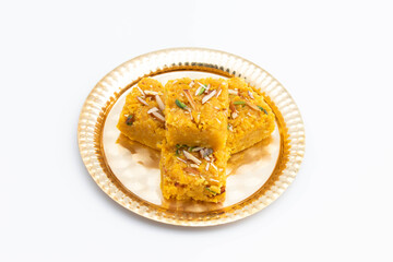 Sindhi Indian Mithai Sev Badam Halwa Burfi Barfee Or Barfi Is Made Of Bengal Gram Flour Besan Kaju Kesar Pista Khoya Meetha Doodh Mawa Malai In Desi Ghee. Isolated On White Background With Copy Space