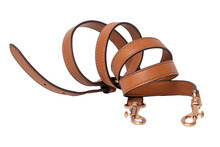 Leather Belt Isolated. Stylish Female Elegant Brown Rolled Leather Belt For A Handbag Or Shoulder Bag Isolated On A White Background. Clipping Path. Fashionable Womans Accessories. Macro.