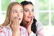 © aletia2011 - Close-up portrait of a charming teenage  girl hugging with mom at home