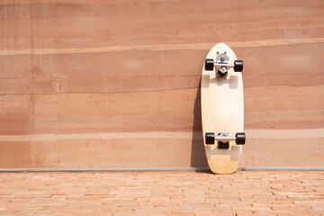 Wall Mural - Surf skate board  on wall background