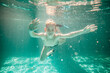 © Виктория Карлова - Cute little boy underwater in swimming pool