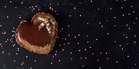 Homemade heart shaped chocolate cake. Love cake. Romantic dessert. Cake in the form of heart.