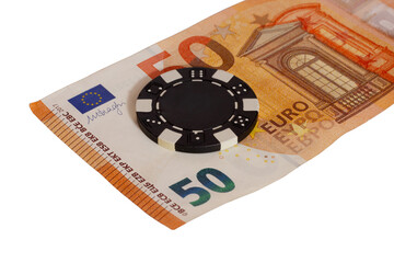 Sticker - Closeup shot of 50 euro banknote with poker chip isolated on white background