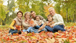© aletia2011 - Family relaxing in autumn park