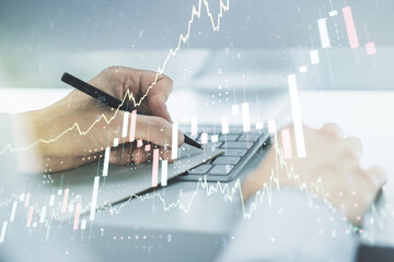 Multi exposure of abstract financial diagram with hand writing in notepad on background, banking and accounting concept