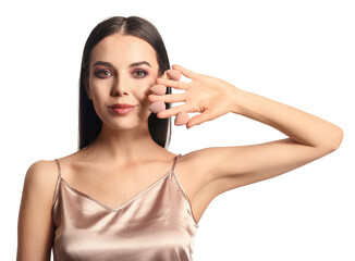 Canvas Print - Beautiful young woman with makeup sponges on white background