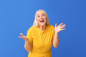 Poster - Happy mature woman with beautiful smile on color background