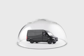 Wall Mural - Black cargo delivery truck protected under a glass dome