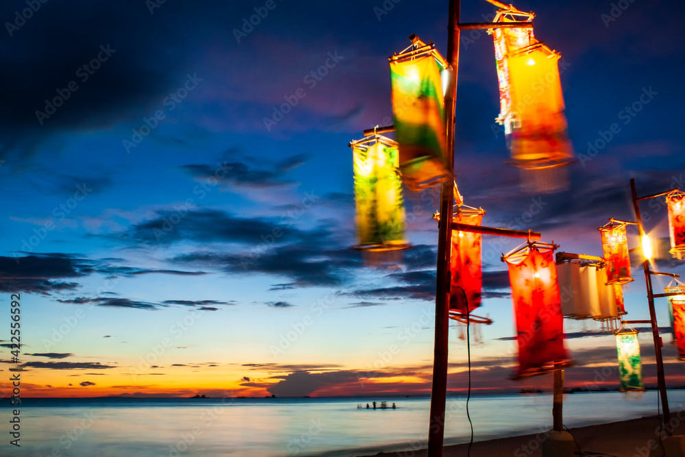 a colorful lantern on the beach of Boracay island with a dramatic