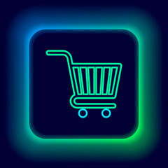 Poster - glowing neon line shopping cart icon isolated on black background. online buying concept. delivery s