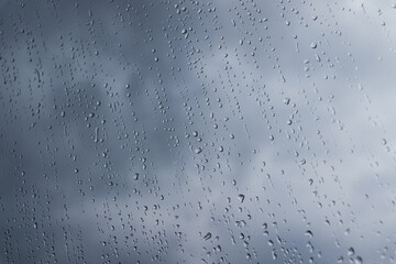 water drops on window glass, closeup. rainy weather
