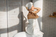 © Alexandr - beautiful young woman in a white towel in the bathroom