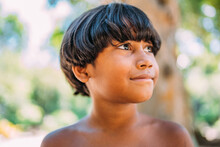 Young Indian From The Pataxo Tribe Of Southern Bahia. Indian Child Looking To The Right. Focus On The Face