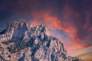 Wall Mural - A majestic view of the rocky mountains ranges in beautiful pink sunset