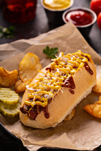 Chili Hot Dog With Onion And Mustard