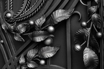 Wall Mural - Forged metal gate decorations in dark colors