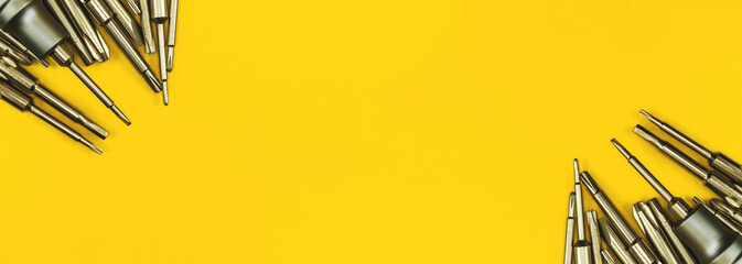 Set of screwdriver tool banner with copy space on a yellow background