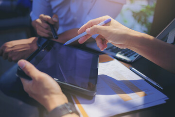 Businessman using hand gesture while explain business report and discussion in the meeting. Selected focus