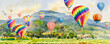 © Painterstock - Watercolor landscape painting colorful of hot air balloon on village