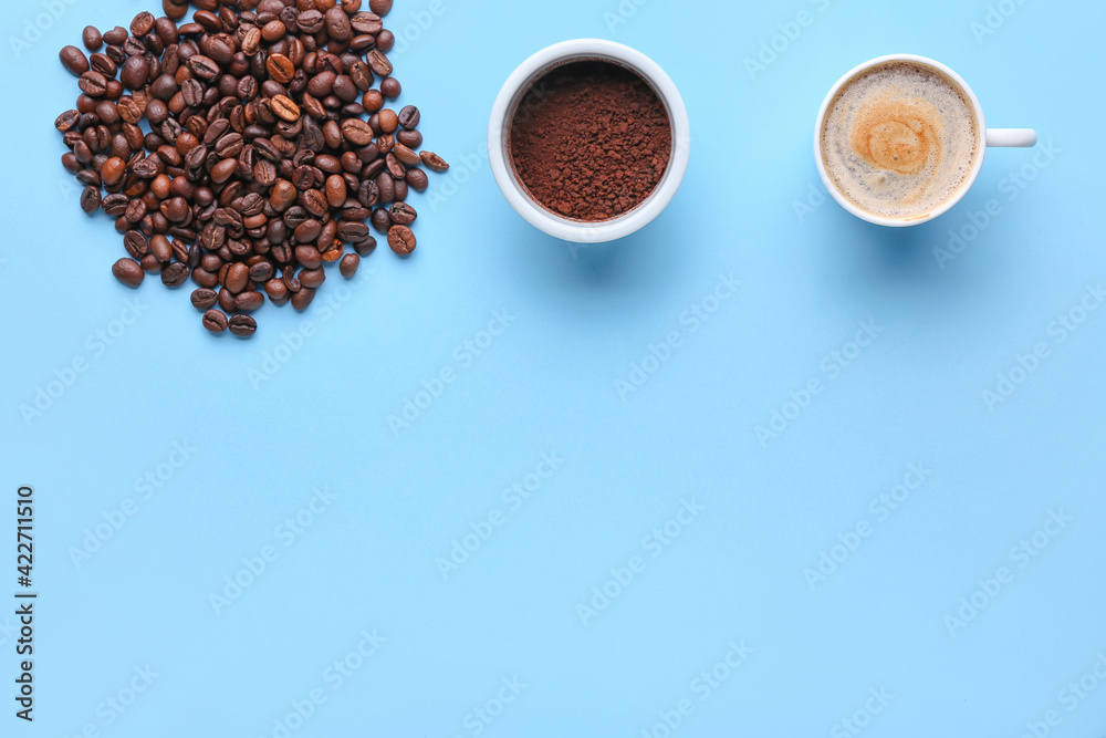 Composition with cup of hot coffee on color background